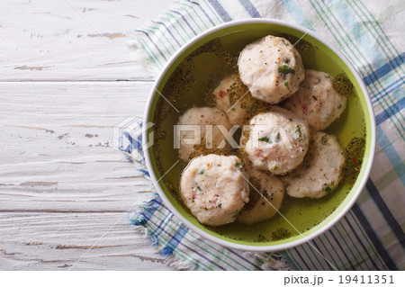 canederli soup on the table. Horizontal top view canederli soup on the table. Horizontal top view 19411351