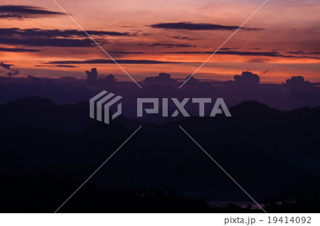 Silhouette of Mountains Above the Water under Silhouette of Mountains Above the Water under 19414092