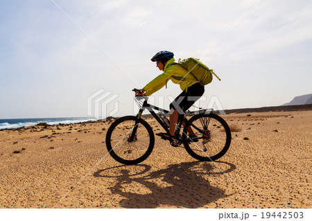 woman with bike on Canary island 19442503