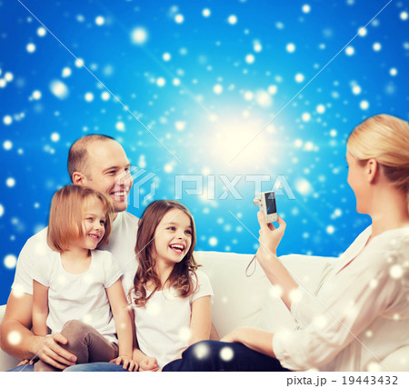 happy family with camera at home happy family with camera at home 19443432