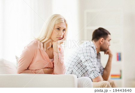 unhappy couple having argument at home unhappy couple having argument at home 19443640