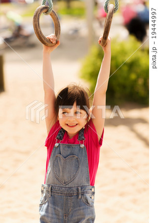 happy little girl on children playground 19444997