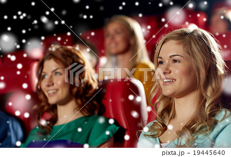 happy friends watching movie in theater happy friends watching movie in theater 19445640