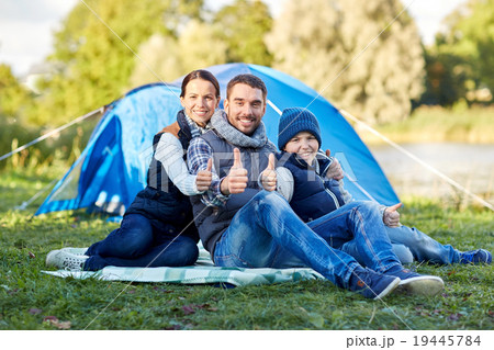 happy family with tent at camp site happy family with tent at camp site 19445784