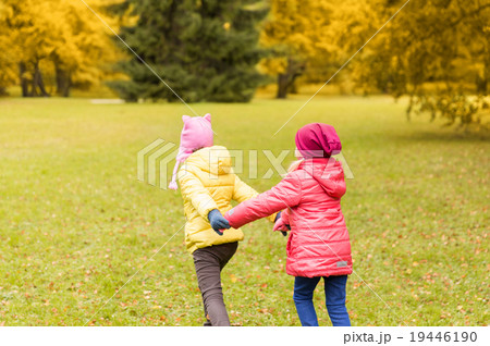 happy little girls running outdoors happy little girls running outdoors 19446190
