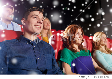 happy friends watching movie in theater 19446320