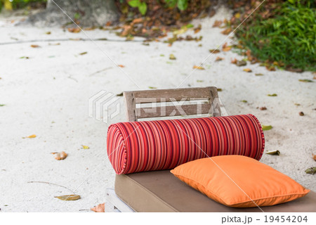 beach bed on white sand among palm trees beach bed on white sand among palm trees 19454204
