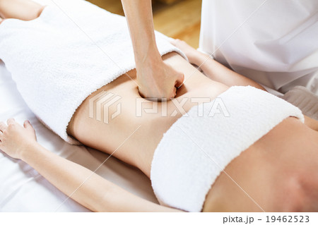 Woman having abdomen massage. 19462523
