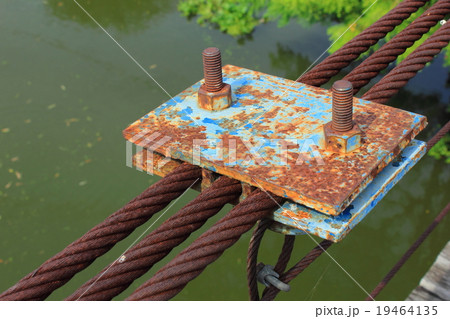 rusty wire rope sling of the part of the bridge. rusty wire rope sling of the part of the bridge. 19464135