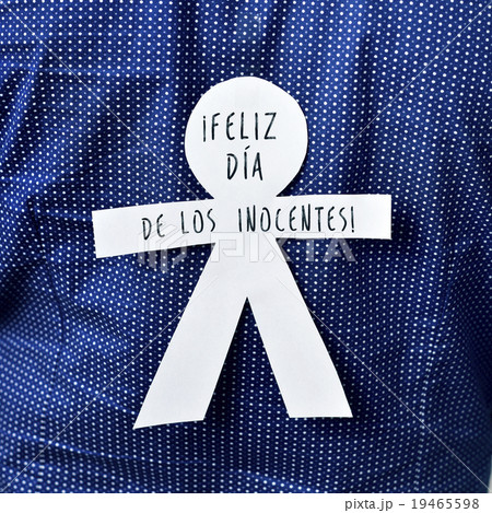 paper man with the text feliz dia de los inocentes 19465598