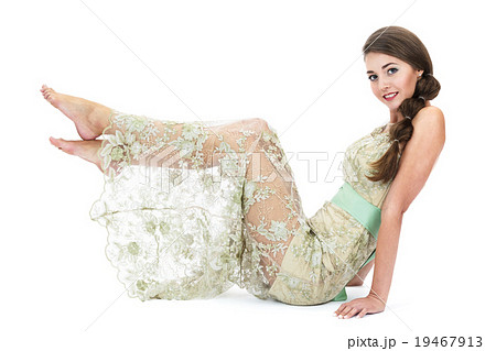 seated woman in atransparent dress 19467913