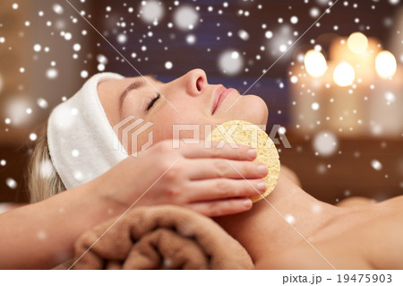 close up of woman having face cleaning in spa close up of woman having face cleaning in spa 19475903