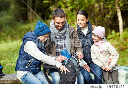 happy family with backpack and thermos at camp happy family with backpack and thermos at camp 19476105