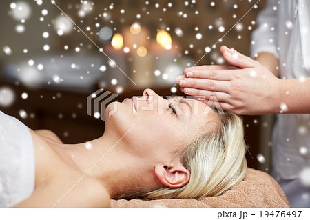 close up of woman having face massage in spa salon close up of woman having face massage in spa salon 19476497