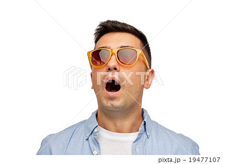 face of scared man in shirt and sunglasses 19477107