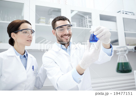 young scientists making test or research in lab young scientists making test or research in lab 19477151