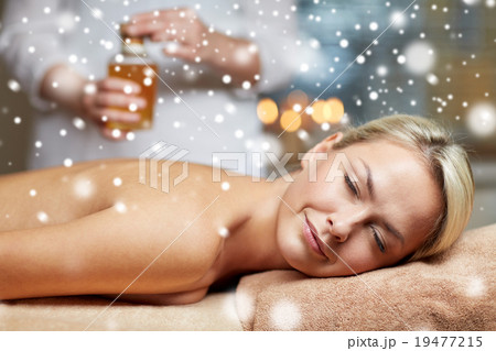 close up of woman lying on massage table in spa 19477215