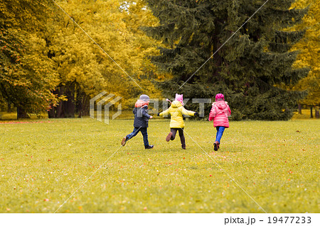 group of happy little kids running outdoors 19477233