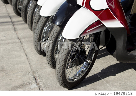 Row of motorcycles on the street 19479218