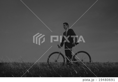 Business Man Pushing Bike Outdoors Concept 19480691