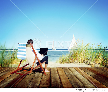 Businessman Holiday Working Business Travel Beach Concept Businessman Holiday Working Business Travel Beach Concept 19485055