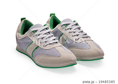 A pair of white sports shoes with shoelace A pair of white sports shoes with shoelace 19485385