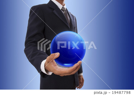 Businessman hand holding blue crystal Ball Businessman hand holding blue crystal Ball 19487798