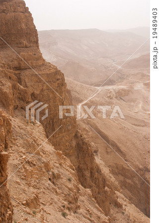 Masada mountain in the haze Masada mountain in the haze 19489403