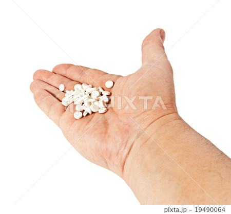 white round pills on hand 19490064