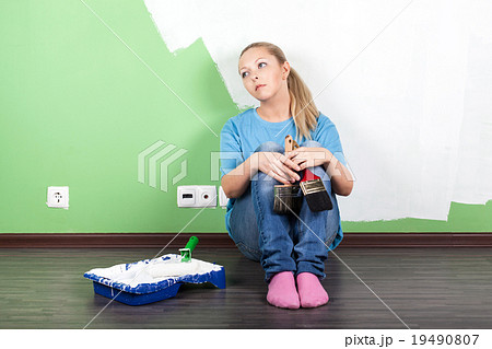 Unhappy woman with paint tools Unhappy woman with paint tools 19490807