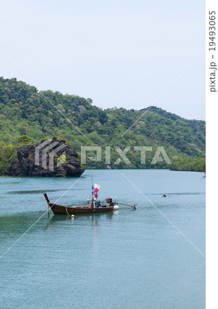 Floating boat on turqoiuse seascape. 19493065
