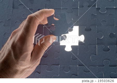 Missing jigsaw puzzle piece with light glow Missing jigsaw puzzle piece with light glow 19503626