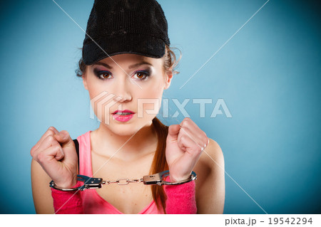 teen crime - teenager girl in handcuffs teen crime - teenager girl in handcuffs 19542294