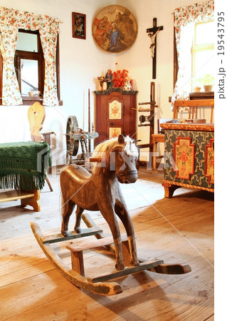 Rocking horse in cottage 19543795