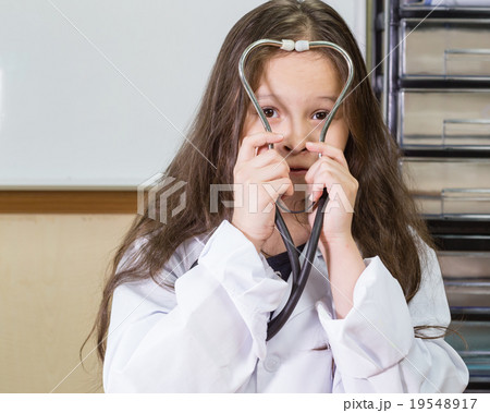 Child doctor with a stethoscope 19548917