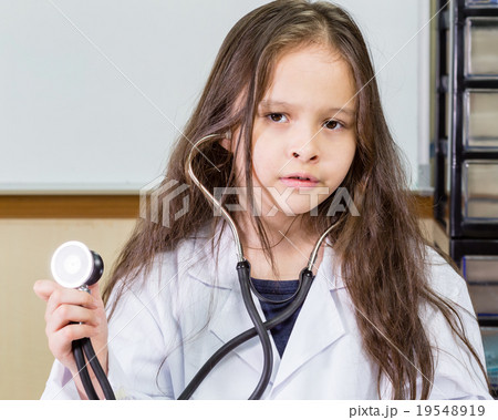 Child doctor with a stethoscope 19548919