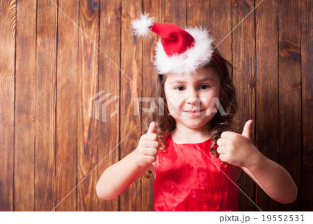 Girl in Santa hat headband 19552531