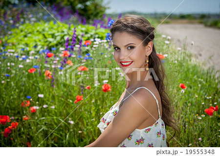 beautiful happy female in the wildflowers beautiful happy female in the wildflowers 19555348