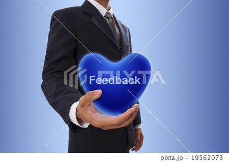 Businessman with feedback word Businessman with feedback word 19562073