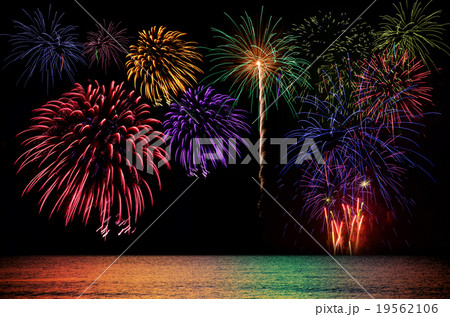 Fireworks celebration and the city night light. Fireworks celebration and the city night light. 19562106