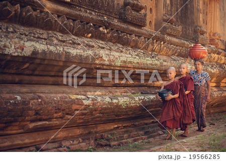 Buddhist novice monks walking alms 19566285