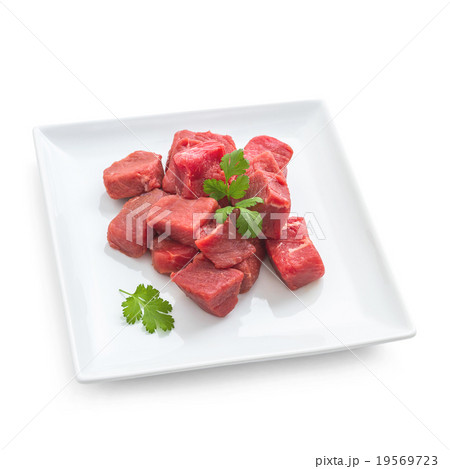 Pile of juicy beef cubes on plate Pile of juicy beef cubes on plate 19569723