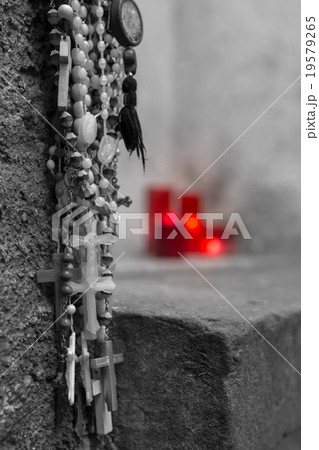 Rosaries and candles 19579265
