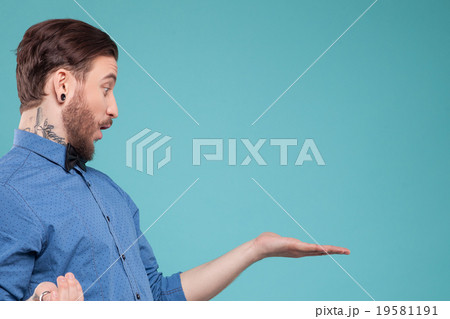 Cool guy with beard is expressing shock Cool guy with beard is expressing shock 19581191