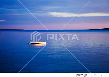 Seascape with White Boat in Blue Sea at Sunset Seascape with White Boat in Blue Sea at Sunset 19589790