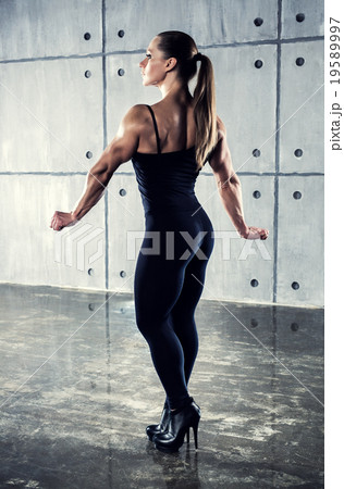 Woman bodybuilder Woman bodybuilder 19589997