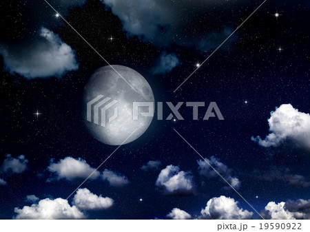 The moon in the night sky in clouds 19590922