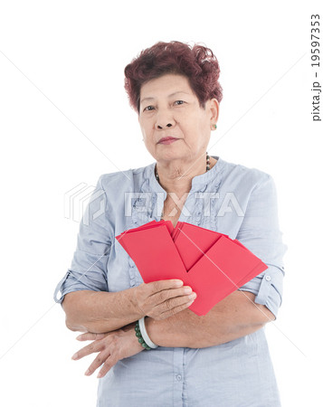 senior chinese new year holding red envelopes  19597353