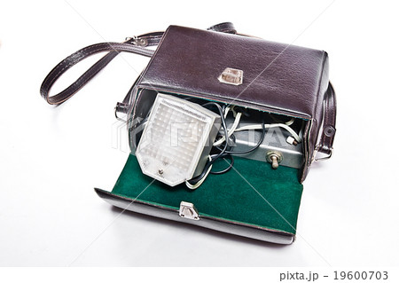 Vintage camera flash isolated on white. Vintage camera flash isolated on white. 19600703