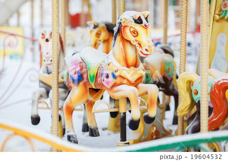 Fairground carousel horses during the day covered Fairground carousel horses during the day covered 19604532